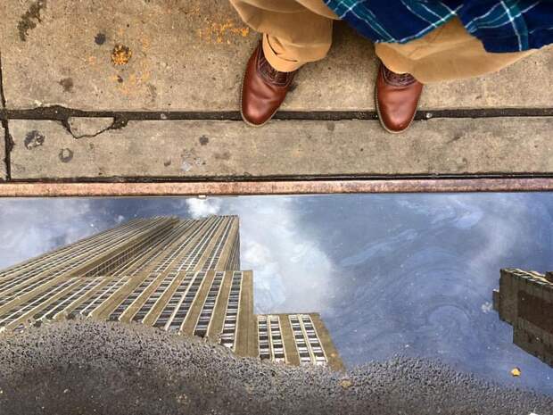 empire-state-building-puddle-reflection-by-ben-hipp