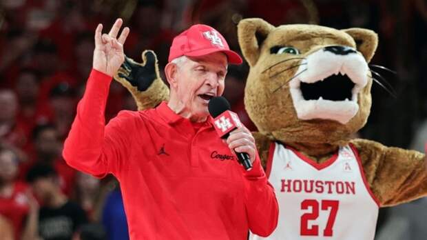 Mattress Mack speaking at a Houston basketball game