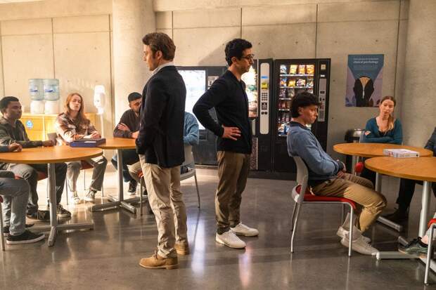 Rizwan and Simon stand back to back as part of Alec's newest demonstration for his student on The Irrational Season 2 Episode 3