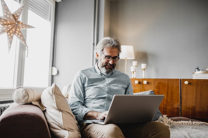 A person using a laptop.