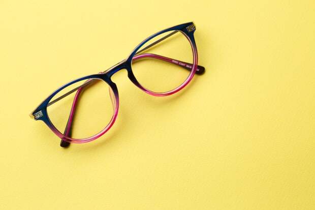 Blue-pink glasses with clear lenses on yellow background empty, Image: 307542477, License: Royalty-free, Restrictions: , Model Release: no, Credit line: Profimedia, Alamy