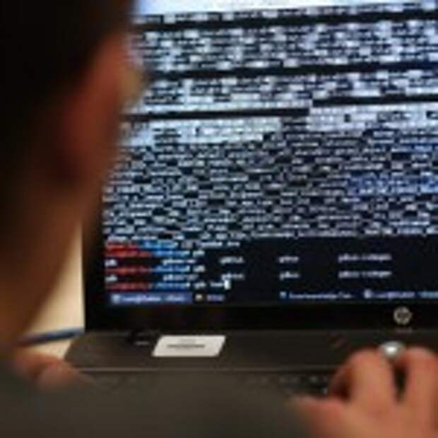 A student from an engineering school attends, on Meudon, west of Paris, overnight on March 16, 2013, the first edition of the Steria Hacking Challenge. AFP PHOTO / THOMAS SAMSON