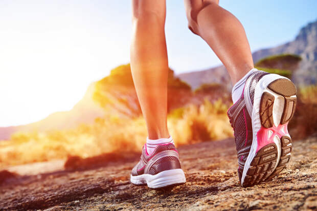 athlete running sport feet on trail healthy lifestyle fitness