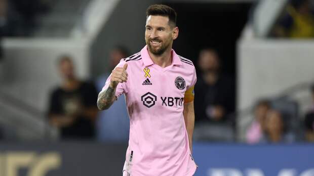 Lionel Messi smiling in his FC Miami jersey