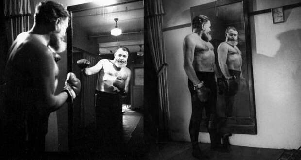 Эрнест Хемингуэй упражняется в боксе перед зеркалом, 1944 г. известные, люди, фото