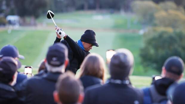 Tiger Woods tees off.