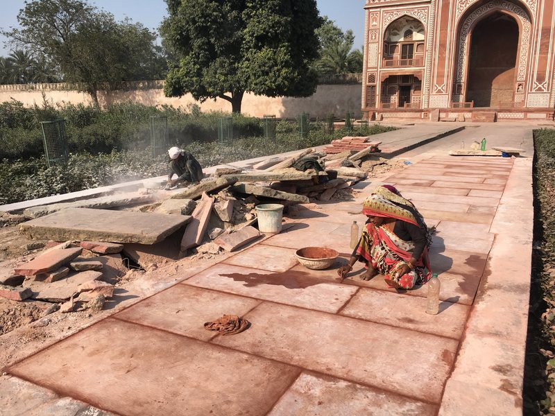 Conservation work on the tomb gardens' water channels.