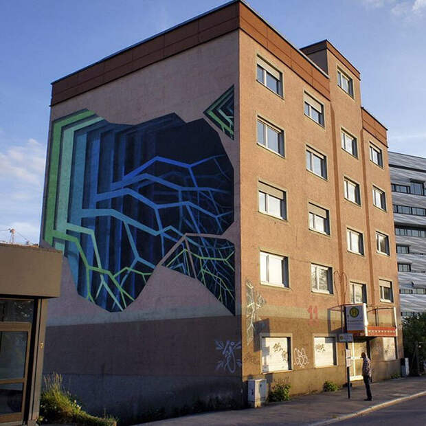 Немецкий художник расписывает здания оптическими иллюзиями, похожими на 3D-порталы