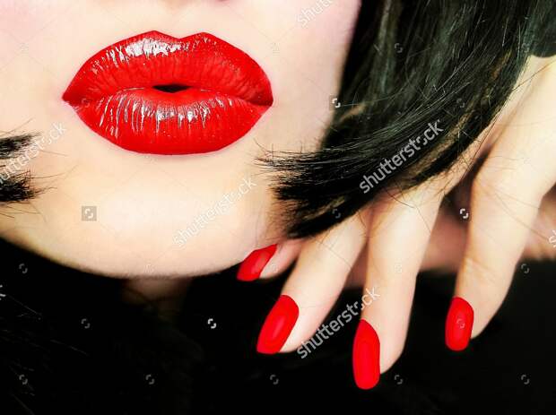 stock-photo-sexy-pretty-woman-with-black-hair-red-lips-and-fingernails-sending-a-kiss-smooch-closeup-119511907.jpg