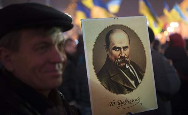 Участник акции сторонников евроинтеграции на Площади Независимости в Киеве