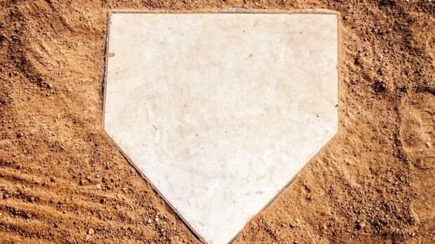 A view of home plate on a baseball field.
