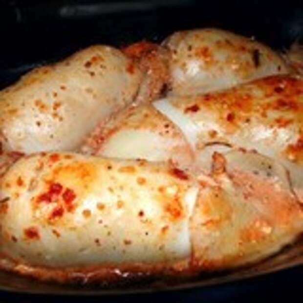 Кальмары, фаршированные рисом и грибами