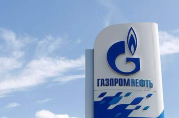 A board with the logo of Gazprom Neft oil company is on display at a fuel station in Moscow, Russia, May 30, 2016. REUTERS/Maxim Zmeyev