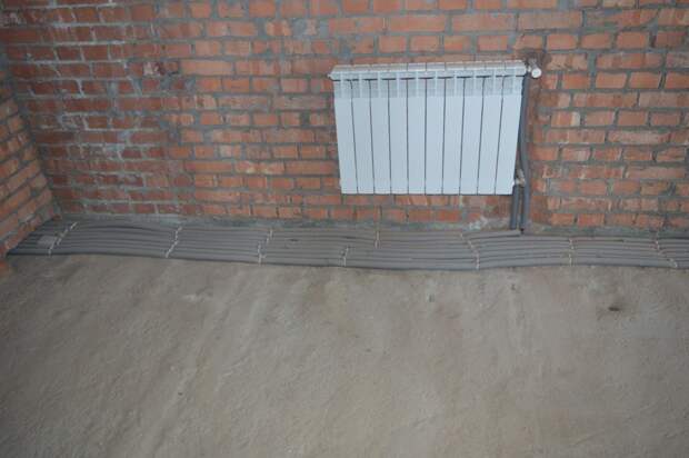 Установка радиаторов отопления в строящемся доме на не отштукатуренные стены