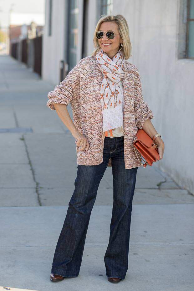 A spring look styled with a multi colored yarn womens cardigan and scarf
