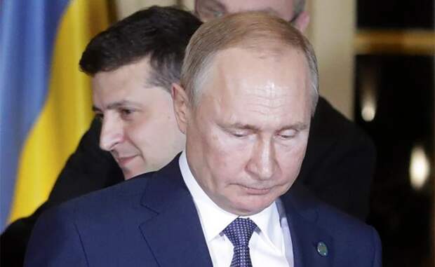 На фото: президент Украины Владимир Зеленский и президент России Владимир Путин (слева направо) во время встречи в рамках саммита "нормандского формата" в Елисейском дворце