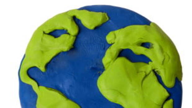 Plasticine planet earth on a white background