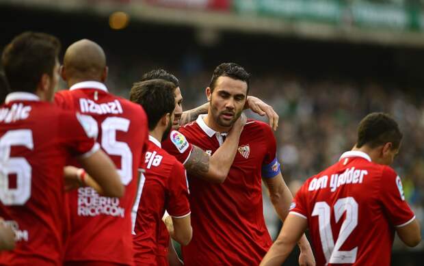 Sevilla's midfielder Iborra (C) celebrates after scoring a goal during the Spanish league football match Real Betis vs Sevilla FC at the Benito Villamarin stadium in Sevilla on February 25, 2017