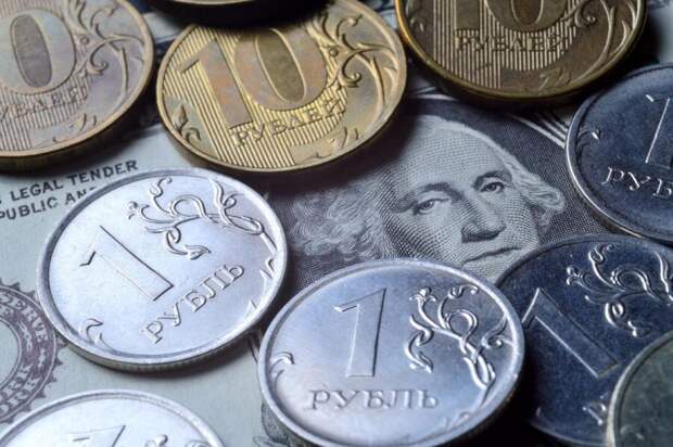 Курс доллара опустился до 90,99 рубля