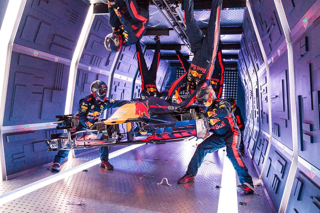 But does it speed up pit stop times? Aston Martin Red Bull Racing’s mechanics pictured performing the Zero-G pit stop aboard an aircraft in Russia.