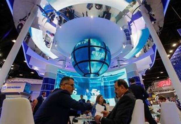 Participant are seen at the Russian VTB bank stand during the St. Petersburg International Economic Forum (SPIEF), Russia, June 6, 2019. REUTERS/Maxim Shemetov