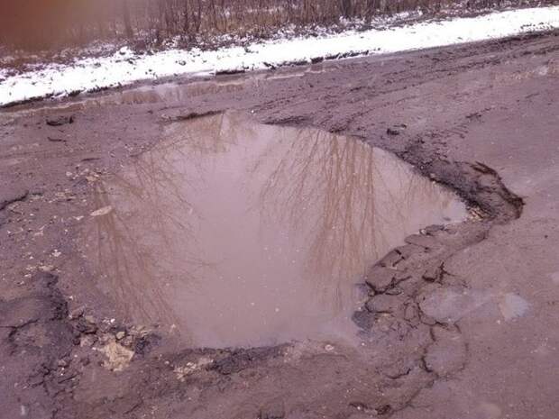 Работы фотоконкурса «Убитые дороги» (15 фото)