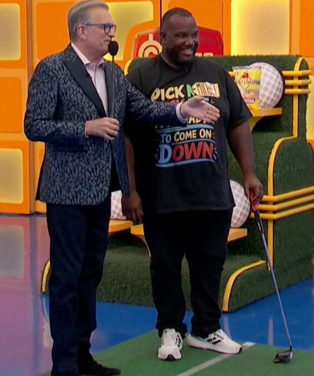 drew carey with contestant on the price is right at night for hole in one
