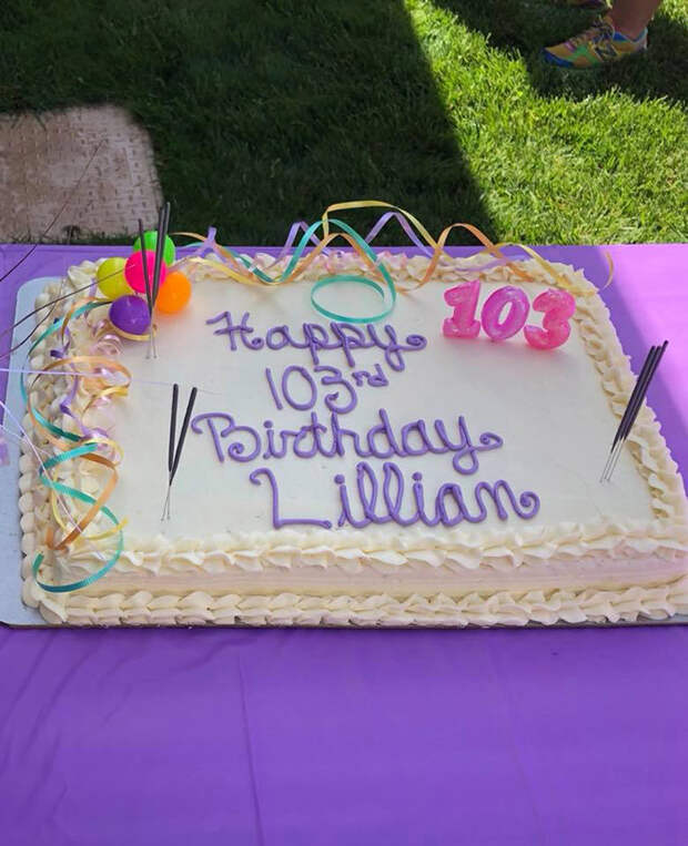 woman surprised with cat 103 birthday