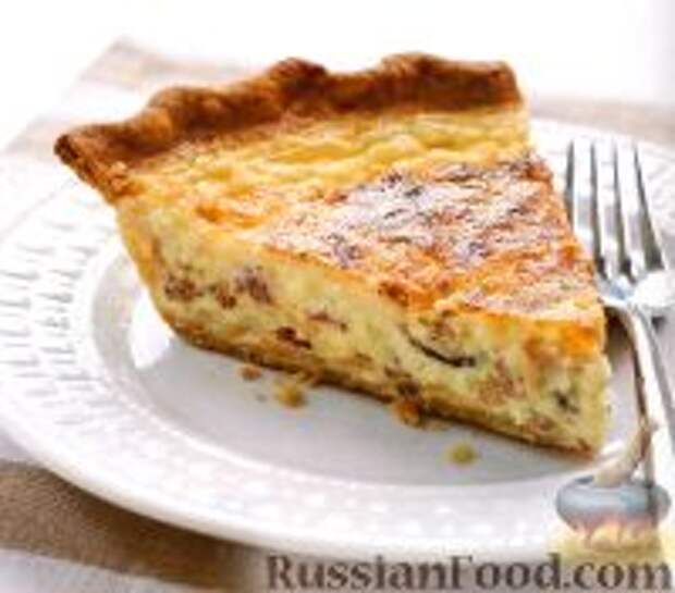 Фото к рецепту: Сырный киш с луком