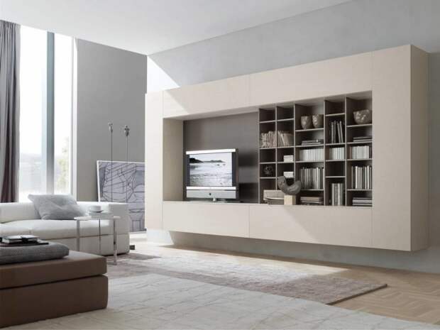 Стильный и оригинальный модульный шкаф - отличное решение, которое визуально увеличит пространство гостиной комнаты. 