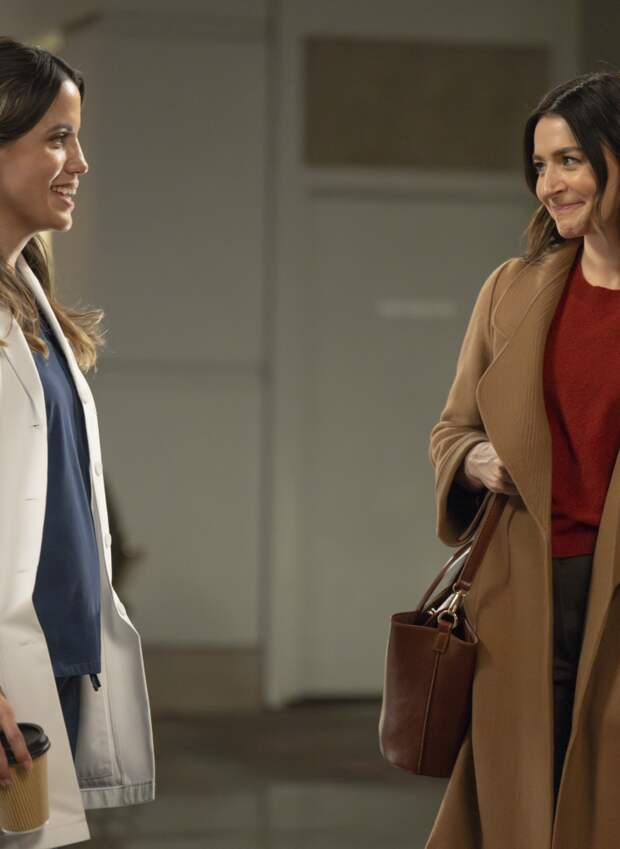 Amelia and Monica flirt after a shift.