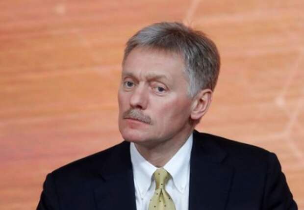 Kremlin spokesman Dmitry Peskov listens during Russian President Vladimir Putin's annual end-of-year news conference in Moscow, Russia December 19, 2019. REUTERS/Evgenia Novozhenin