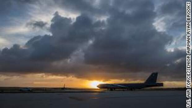 A B-52 Stratofortress taxis down the flightline as the sun sets over Andersen Air Force Base, Guam, March 18, 2019. 