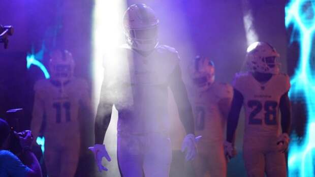 dolphins players in the tunnel