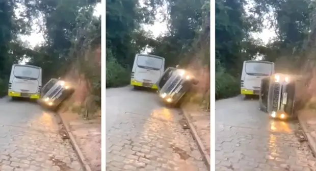 Водитель за рулём Jeep неудачно попытался объехать автобус по практически вертикальной стене