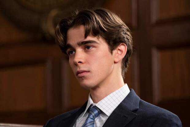 Headshot of a young guy on the witness stand on Law & Order: SVU Season 26 Episode 15