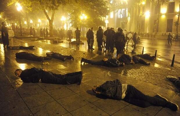 Police detain protesters during clashes in Tbilisi