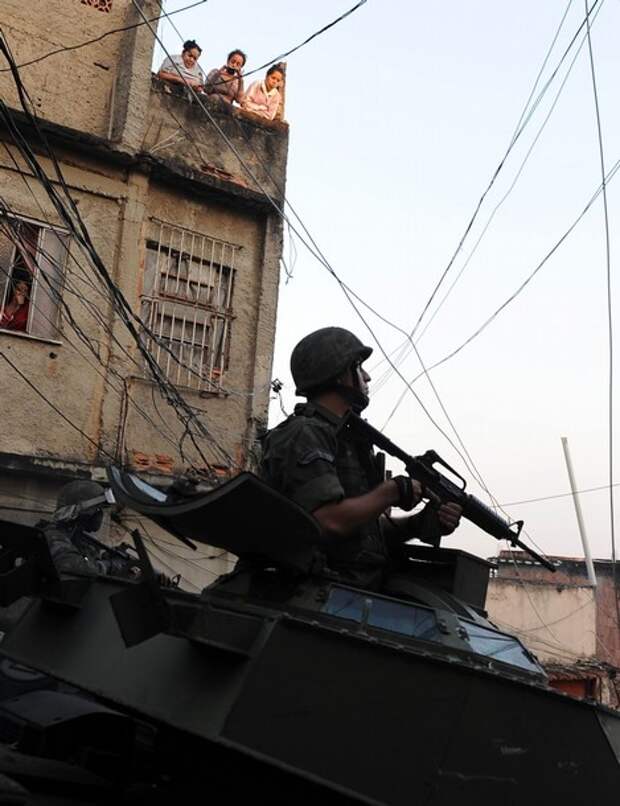 A marine on an armored personnel carrier