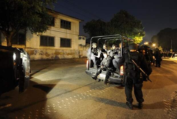 Anti-riot personnel prepare to secure Ma