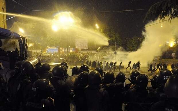 Police use water cannons and tear gas during clashes with protesters in Tbilisi