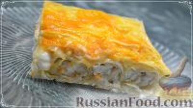 Фото к рецепту: Пирог из лаваша с курицей и сыром (в духовке)