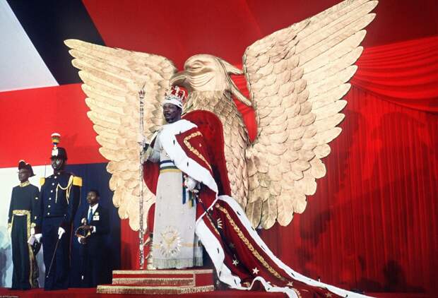 Self-proclaimed emperor of Centrafrican empire, Jean-Bedel Bokassa stands 04 December 1977 on the throne after crowning himself in Bangui, following Napoleon's example