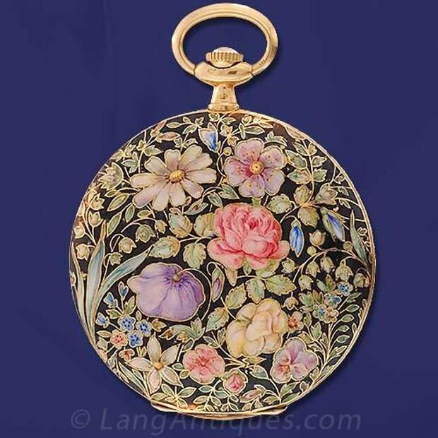 An extraordinary floral enameled hunter case pocket watch with Longines case, J. Schultz 17 Jewel movement, circa 1900, featuring a gorgeous enameled case with black background and a multi-color floral design: 