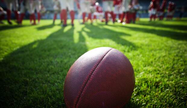 college football players on field