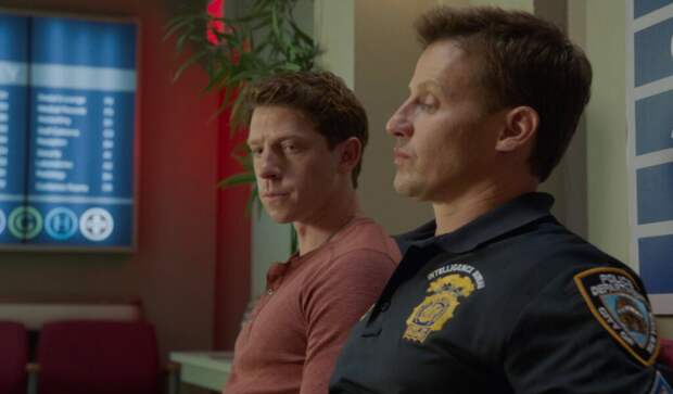 Jamie and Joe wait together in the hospital on Blue Bloods Season 14 Episode 18