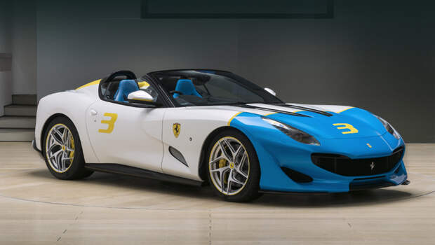 Ferrari sp3jc. Как объясняет производитель, яркая графика на кузове обусловлена тягой заказчика к поп-арту. Здесь использована комбинация цветов Bianco Italia (белый с намёком на серебро), Azzurro Met (синий) и Giallo Modena (жёлтый).