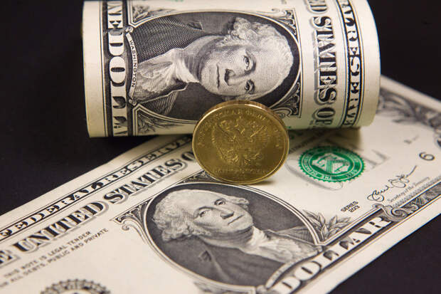 Курс доллара утром 16 мая вырос до 91,06 рубля