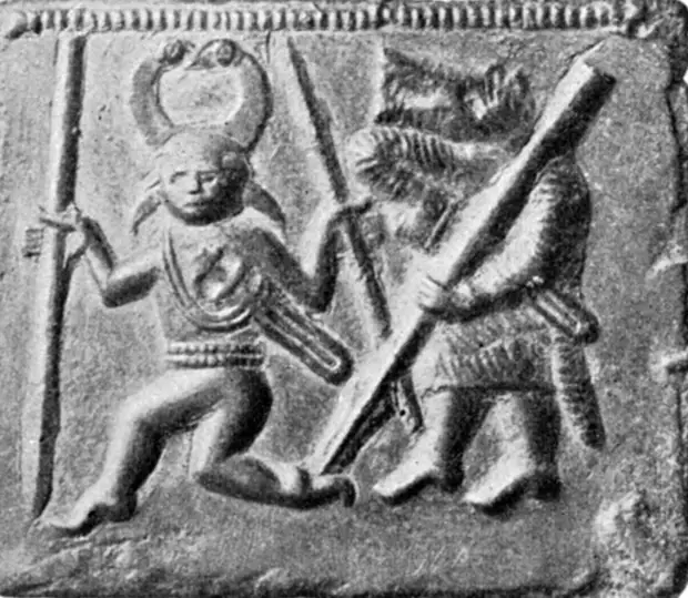 Изображение бога Одина и идущего за ним берсерка