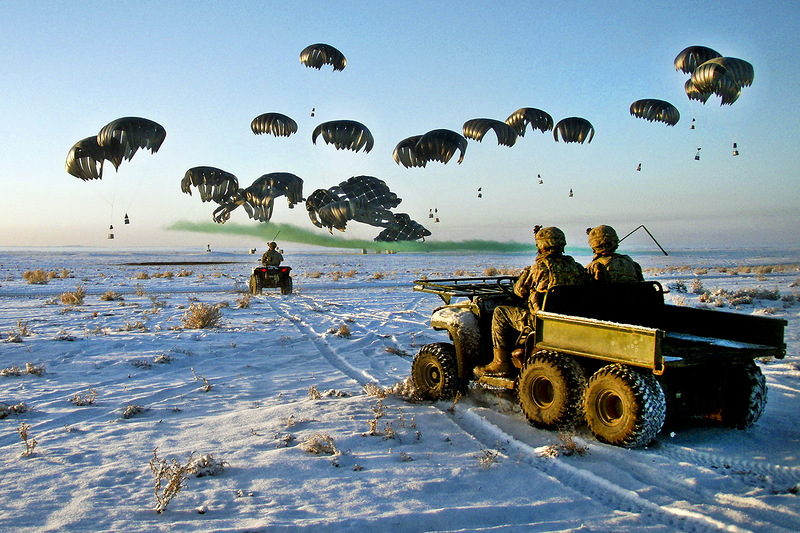 110130-A-0000X-540        U.S. Army soldiers in four-wheel drive vehicles wait as bundles of fuel are air delivered by a C-17 Globemaster III to Forward Operating Base Waza K'wah in Paktika province, Afghanistan, on Jan. 30, 2011.  The soldiers are assig