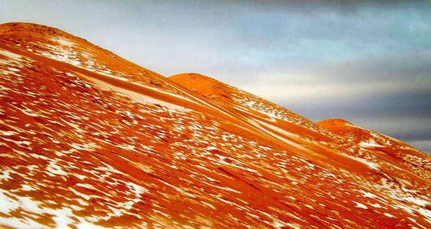 rare-snow-sahara-desert-geoff-robinson-3